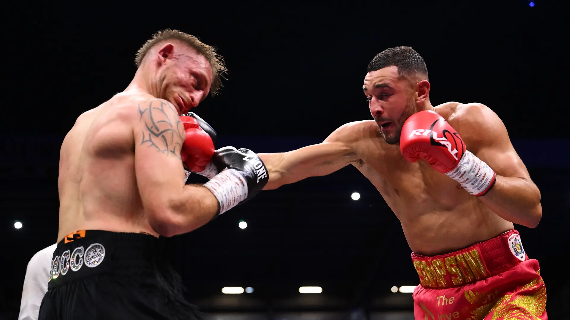 Callum Simpson lands a powerful right hand on Ivan Zucco during round ten stoppage